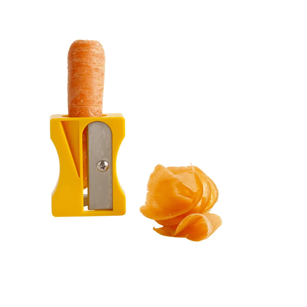 Yellow pencil-sharpener-shaped vegetable tool holding a carrot, beside a curled carrot garnish